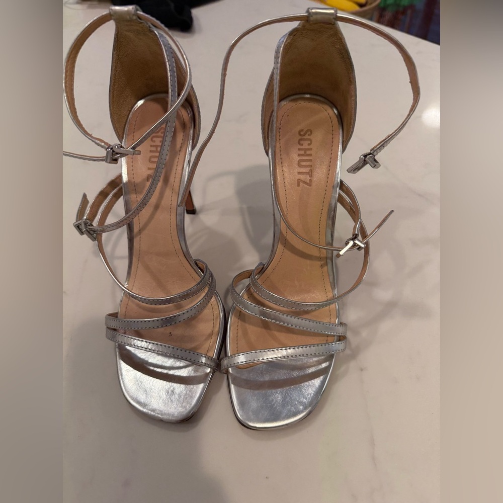 Schutz silver sandals.